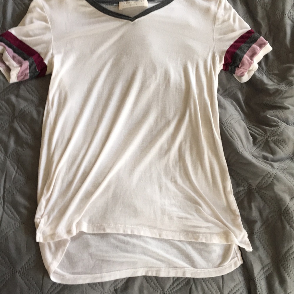 White shirt with purple and gray striped sleeves